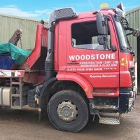woodstone skip hire skip truck with skip